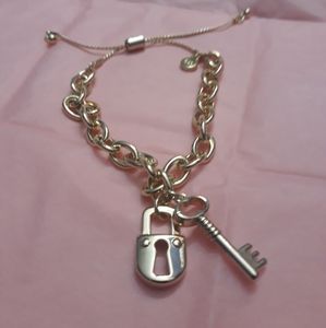 Mary Kay " you hold the key" gold bracelet.NWT